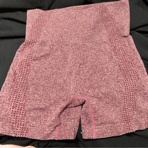 2 pairs of athletic workout shorts. Size medium fits like a size 4